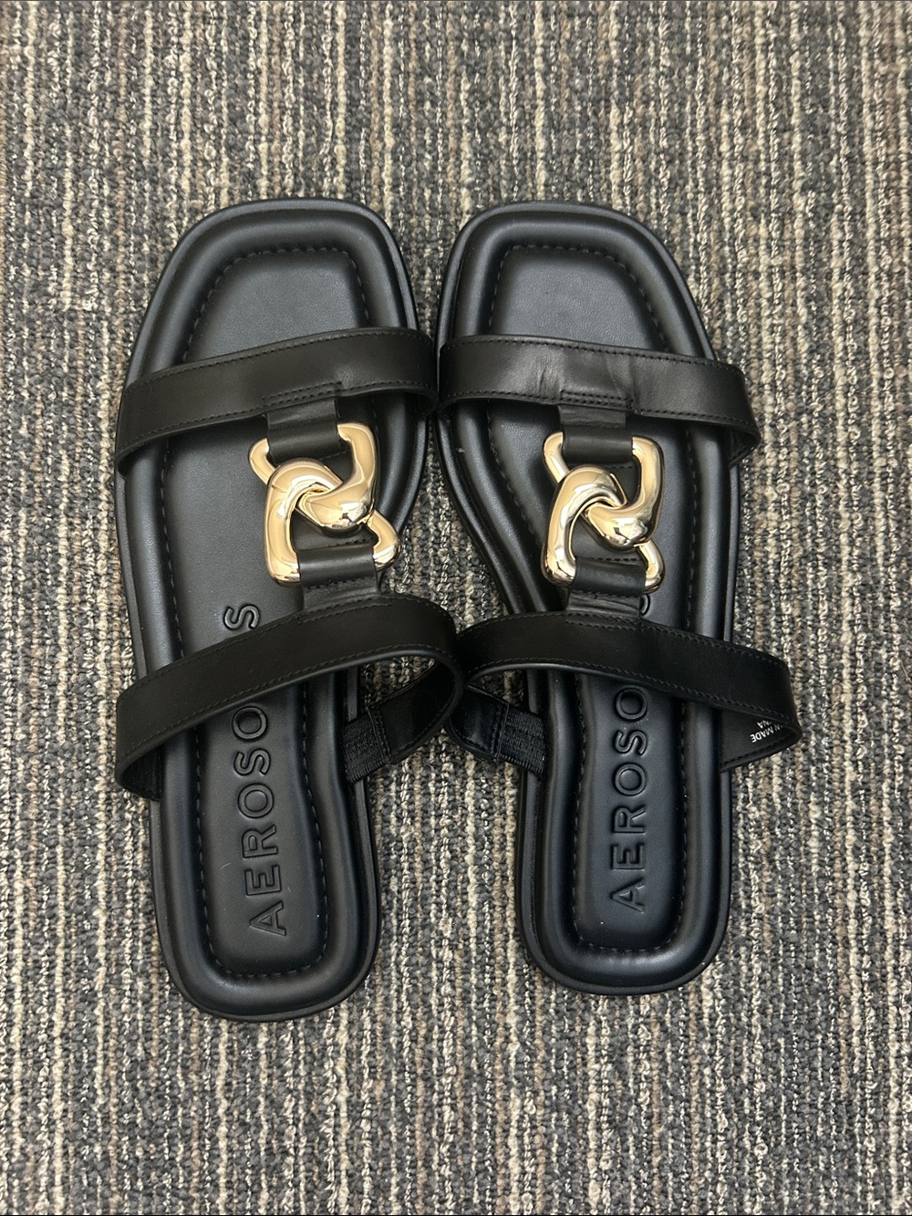 AEROSOLES Black Slide Sandals with Gold Link Accent